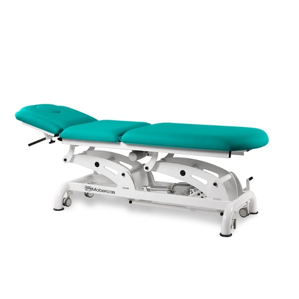 Lettino elettrico multifunzionale per osteopatia con 2 motori per la regolazione dell'altezza e del poggiapiedi tramite comando manuale.