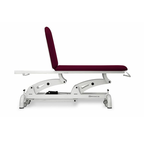 Barella da visita elettrica: due scocche, con due motori per la regolazione dell'altezza e dello schienale, portarotolo, cuffia facciale e ruote retrattili