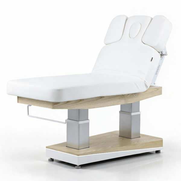 Lettino da trattamento HELAN SPA con 4 motori, riscaldamento e base in legno naturale.